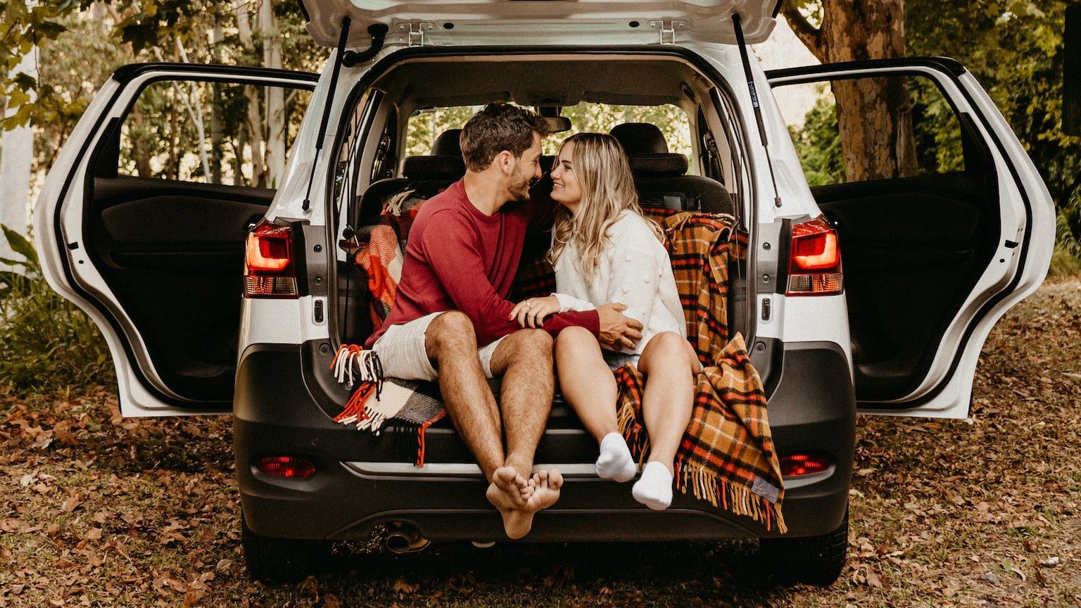Couple sitting in a car