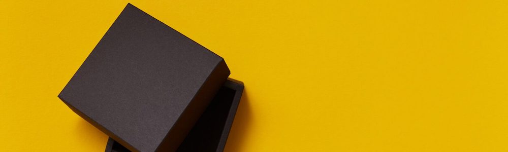 Two black boxes on a yellow background.
