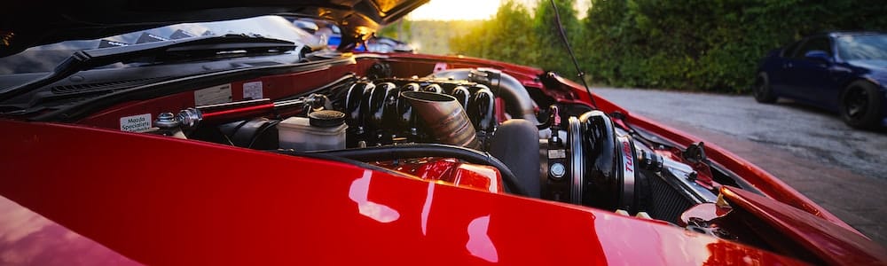 Car engine in a rural setting