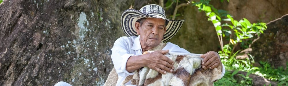 Man handling animal skins