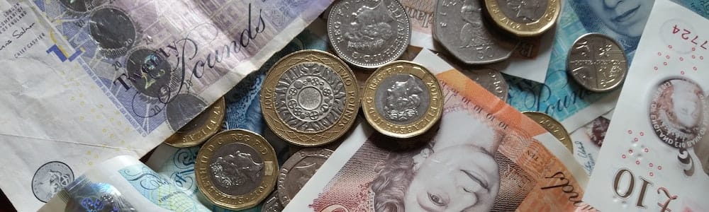 A lot of UK bank notes and coins