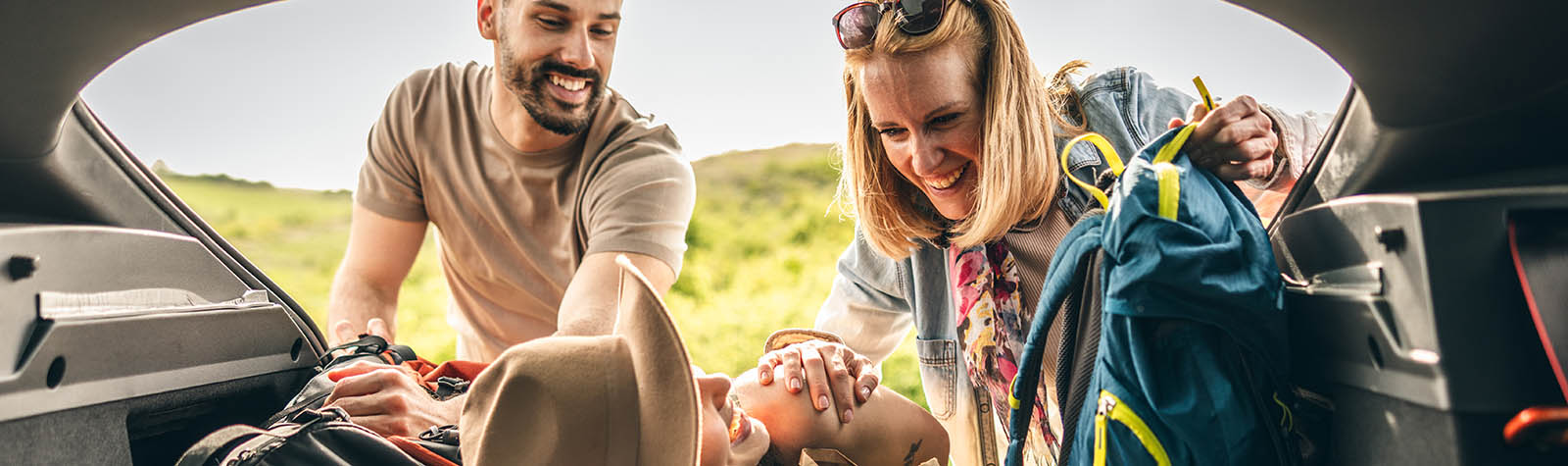 Friends on a road trip, using Zixty day insurance